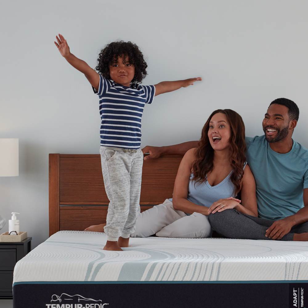 Tempur-Adapt Medium Hybrid Mattress, family on bed